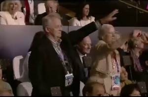 German official questionably waves his country's delegation at the 2012 Summer Olympics (Caption: Youtube)