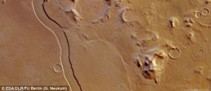A channel with a width of 7 km and a depth of 300 meter is thought to have been formed by water that once ran on Mars surface