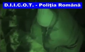 The moment when Romanian police captures 3 gang members who were mounting a bomb on a car in Piatra Neamt, Romania.
