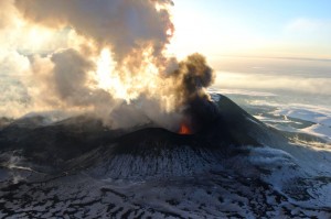 This flyover photo was snapped on Jan. 6, 2013 and shows Tolbachik volcano spewing ash and smoke in the atmosphere of Kamchakta Peninsula