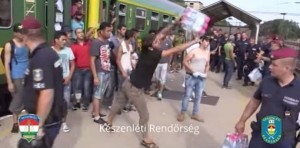 Aggressive migrants wasting water and food right before Hungarian police